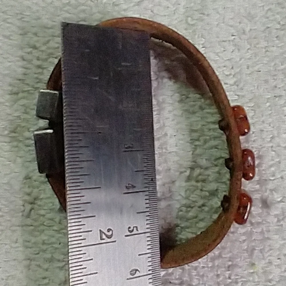 Silvertone faux amber brown leather bracelet